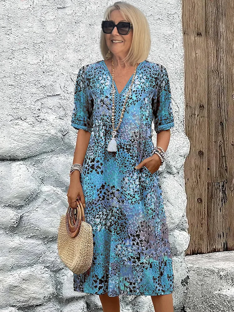 Zorka – élénk midi ruha elegáns hasfedéssel